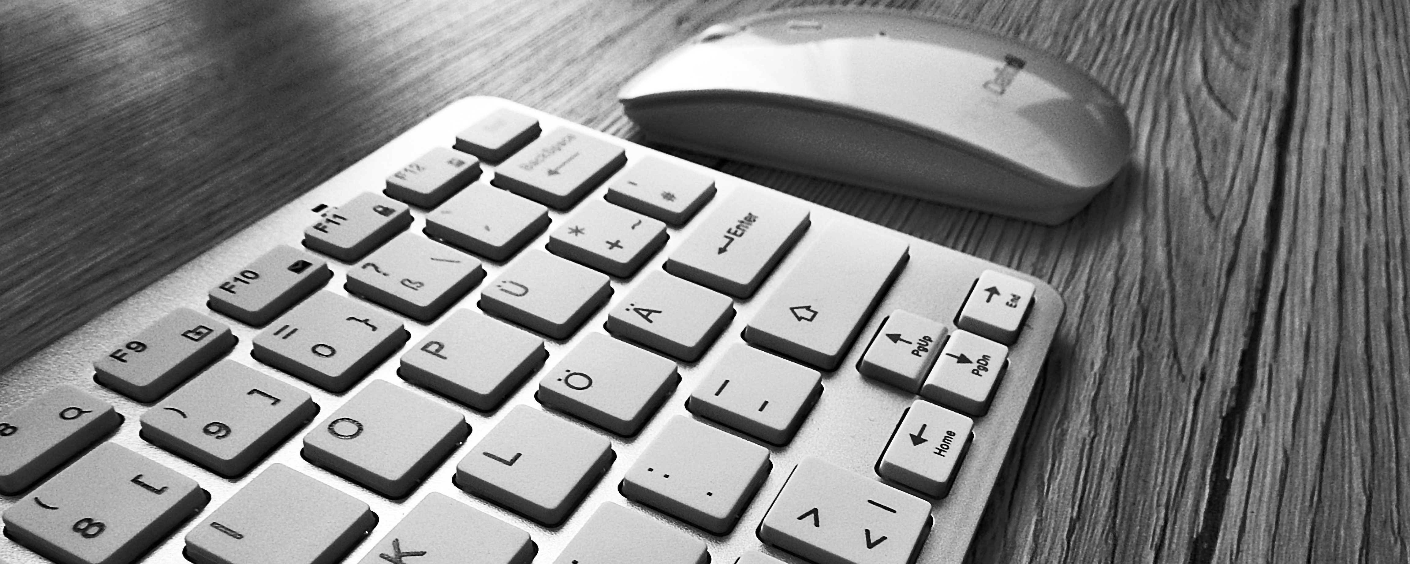 black-and-white-computer-keyboard-desk-209692